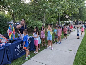 Glenview Bank & Trust provides games for kids at an outdoor concert.